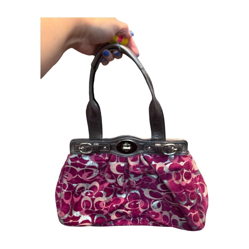 the Coach Mia Optic Signature Turnlock Shoulder Bag